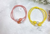 Set 100 dây cột tóc kết 4 hạt ngọc mix màu